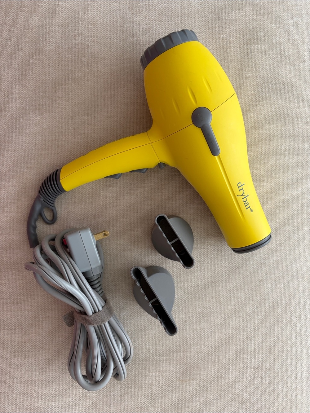 Drybar Yellow Hair Dryer with Gray Nozzles and Cord